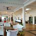 Sari Pacifica Resort & Spa, Redang Island lobby lounge with white seating and open-air columns