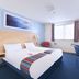 Travelodge Manchester Birch M62 Eastbound guest room in Heywood with twin beds and desk