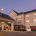 Country Inn & Suites by Radisson, Doswell, VA hotel exterior with covered entrance and flagpole