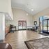 Days Inn by Wyndham Fontana / Rialto lobby with seating area and glass entrance in Rialto