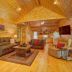 Paradise Hills, Winery Resort & Spa in Blairsville, rustic wood-paneled lounge with seating and TV
