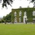 Hardwicke Hall Manor Hotel in Hartlepool, ivy-covered manor with lawn and front entrance