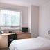 Residence & Conference Centre - Oakville guest room with bed, desk, chair and window