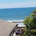 Thaiji Pousada e Parador in Florianopolis with ocean view over a rooftop and greenery