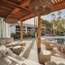 The Scott Resort & Spa Scottsdale poolside cabana with loungers and palm trees