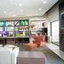 Holiday Inn & Suites Phoenix Airport By IHG lobby with seating and front desk area in Phoenix