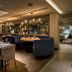 Grenshotel de Jonckheer in Ossendrecht dining room with curved banquette seating and pendant lights
