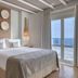 Santa Marina, a Luxury Collection Resort, Mykonos bedroom with sea-view balcony in Ornos