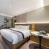 Home Inn Style Shanghai Railway Station Zhongxing Road Metro Station guest room in Shanghai with bed and desk