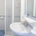 Bathroom at Terme Miramonte e Mare in Casamicciola Terme with sink, toilet and shower