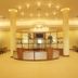 Soho Hotel & Casino at Sun City Resort lobby with reception desk and warm ambient lighting