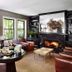 Gaige House in Glen Ellen lounge with fireplace, leather chairs, round table and large windows