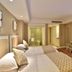 Zhong'an Huana Holiday Hotel in Hangzhou guest room with twin beds and wall-mounted TV