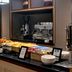 Eglinton Arms Hotel, BW Premier Collection in Glasgow breakfast buffet with pastries, fruit, coffee machine and plates