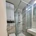 Villa Montmartre - Nouvellement Rénové bathroom in Paris with glass shower, wall-mounted toilet and sink