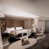 Landgoed Lauswolt in Beetsterzwaag suite with king bed, seating area, and herringbone wood floors