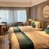Fairyland Hotel - Kunming Nanping Pedestrian Street Store room with two beds and window seating in Kunming