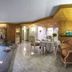 Vitalhotel Die Mittelburg in Oy-Mittelberg: indoor pool beside a tiled lounge and dining area