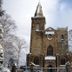 Pitbauchlie House Hotel Sure Hotel Collection by Best Western in Dunfermline beside a snow-covered church