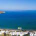 Pension Ageliki in Platis Gialos with sea view over a calm blue bay and sandy beach