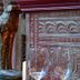Treacy's Hotel in Enniscorthy with ornate carved woodwork, decorative statue and glassware