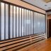 Tabist Sparkling Dolphins Inn Kyoto meeting room with wooden table and slatted bench in Kyoto