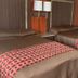 Prince of Wales Motel in Lake Wales guest room with two double beds and bedside lamps