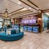Fairfield Inn & Suites by Marriott Alamogordo lobby with teal seating, tiled floor and reception desk