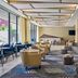 Delta Hotels by Marriott Ashland Downtown lobby with lounge seating and floor-to-ceiling windows
