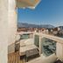 Avala Resort & Villas, Budva balcony with sea view, glass railing and seating overlooking the coast