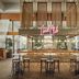 The Scott Resort & Spa Scottsdale lobby bar with Canal Club sign and high-top seating