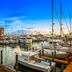 Best Western Plus Yacht Harbor Inn in Dunedin overlooking marina boats and sunset harbor views