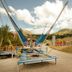 The Approach Hotel, Panorama: outdoor bungee trampoline area with mountain views and colorful play structures