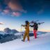 Hotel Touring Wellness and Relax in Santa Cristina Valgardena: skiers on a snowy mountain slope at sunset