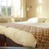 Landgoed Huize Glory in Bergen aan Zee guest room with double bed and window view