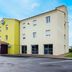 B&B HOTEL Agen Castelculier in Castelculier, exterior of a beige and yellow hotel building