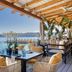 Santa Marina, a Luxury Collection Resort, Mykonos terrace dining with sea view in Ornos
