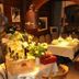 Landhotel Binderhäusl Garni in Inzell, cozy restaurant dining room with set tables and rustic wood beams