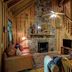 Paradise Hills, Winery Resort & Spa in Blairsville: rustic cabin living room with stone fireplace and staircase