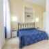 Terme Miramonte e Mare room in Casamicciola Terme with bed and adjacent bathroom