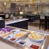 Staybridge Suites Sioux Falls At Empire Mall breakfast buffet with fruit, pastries and hot dishes