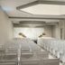 Four Points by Sheraton Milwaukee North Shore in Brown Deer wedding ceremony setup with white chairs and floral aisle