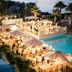 Canne Bianche Lifestyle Hotel in Torre Canne with seaside pool terrace dining at sunset