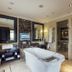 Soho Hotel & Casino at Sun City Resort bathroom with freestanding tub and glass shower