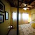 The Bed and Breakfast at Peace Hill Farm in Charles City, cozy bedroom with four-poster bed and ceiling fan
