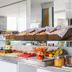 Citi Hotel Express Caruaru breakfast buffet with fruit, pastries and cereal in Caruaru
