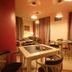 Palace Hotel Una Nuova Strada in Nocera Terinese lounge with tables, chairs and warm pendant lighting