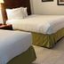Gulfview Hotel - On the Beach guest room with two beds and tiled floor in Clearwater Beach