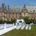 B&B Chateau de Villersexel in Villersexel with outdoor wedding setup on the lawn before the château