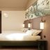 Unaway Hotel Occhiobello A-13 guest room in Rovigo with double bed, desk and chair